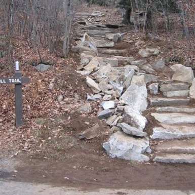 Section of the Pine Hill Trail after a few weekends of setting new rock steps and scree wall for trail definition, using a Griphoist highline system to quarry and move the rocks into position.  