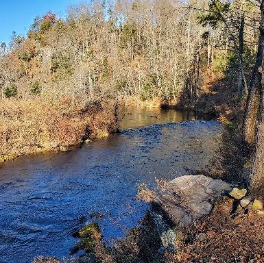 Walking along the river on the Violet Trail.