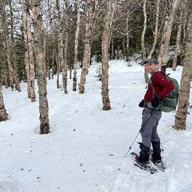 Mike Cobb snowshoeing up Isolation