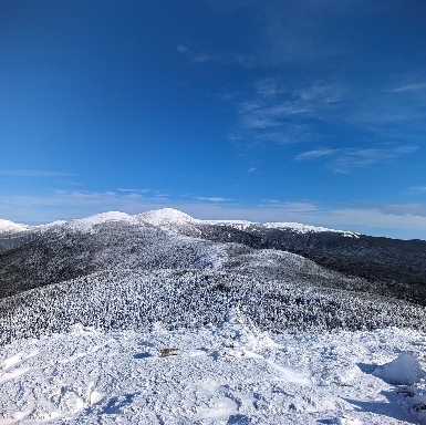 Snowy view up the Presidential Range from Mt. Pierce