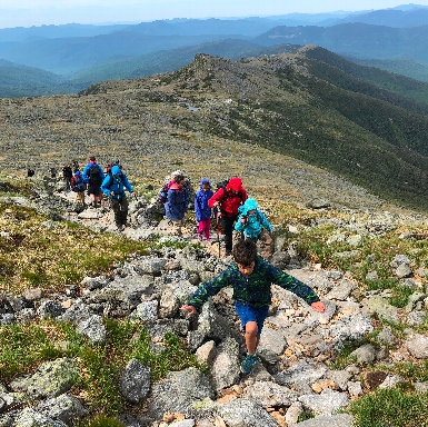 Kids hiking up Mount Washington